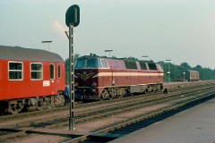 DSB MZ 1424 (type II) photographed in Fredericia July 1975.  The MZ class (type I and II) was purchased from 1967 to 1970 in a number of 26. Only a few of these engines remain in service by DSB - most are now sold to other companies. MZ 1424 was deposited in 1998. Built by NOHAB and Frichs. Dieselelectric. Co'Co'. 2270 kW - 3300 hp. Max speed 143 km/h - 89 mph. Length 20 800 mm. Weight 116,5 metric tonnes.